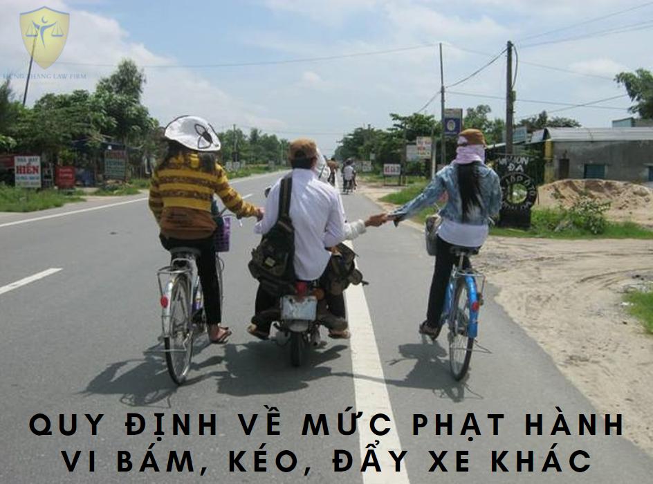 Quy định về mức phạt hành vi bám, kéo, đẩy xe khác
